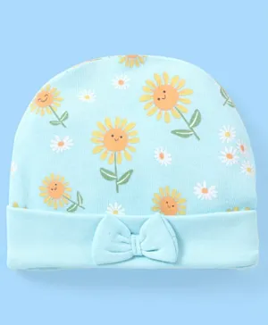 قبعة قطنية بنسبة 100% من بيبي هاغ مطبوعة بزهور دوار الشمس مع تطريز بشكل فيونكة - أزرق