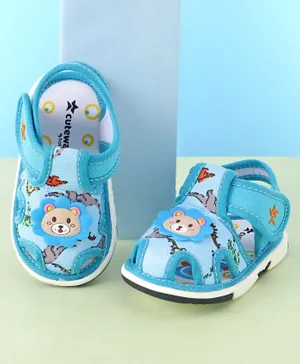Cute Walk by Babyhug Slip On Musical Sandals with Velcro Closure & Teddy Applique - Blue