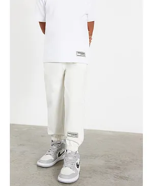 The Giving Movement Sustainable Lounge Joggers - White