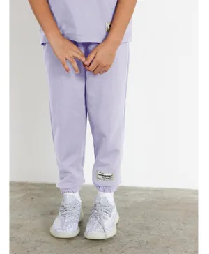 The Giving Movement Sustainable Lounge Joggers - Pastel Purple