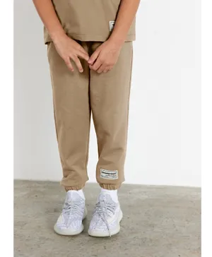 The Giving Movement Sustainable Lounge Joggers - Beige