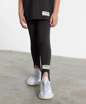The Giving Movement Sustainable Recycled Stirrup Leggings - True Black