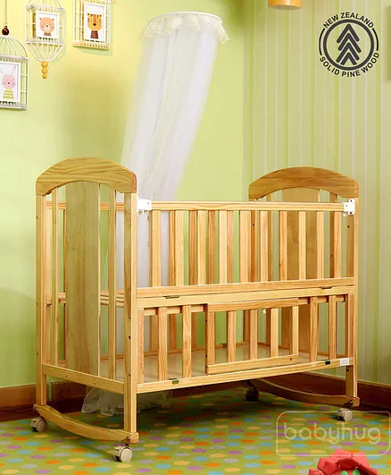 Babyhug Florence Wooden Cot with Rocker Storage Mosquito Net 0 to 3 Years Natural Finish New Zealand Pine Wood Online in UAE Buy at Best Price from FirstCry.ae 1694303