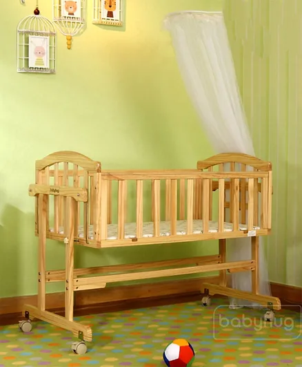 بيبي هاغ - سرير أطفال أيونيا المتأرجح الخشبي مع ناموسية - لون محايد طبيعي