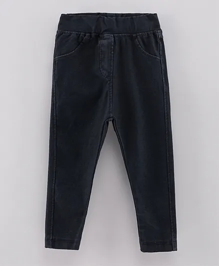 جينز ضيق بخصر مطاطي من مينوتي - أسود