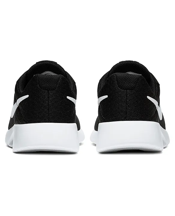 Nike tanjun hotsell gs black